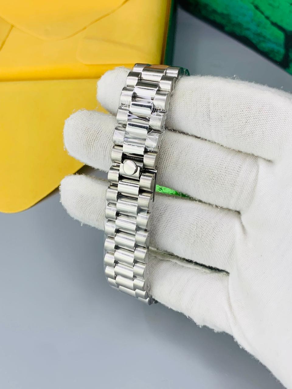 Luxury Silver  Dial Rolex Date Style Watch – Elegant Diamond Markers & Stainless Steel Band